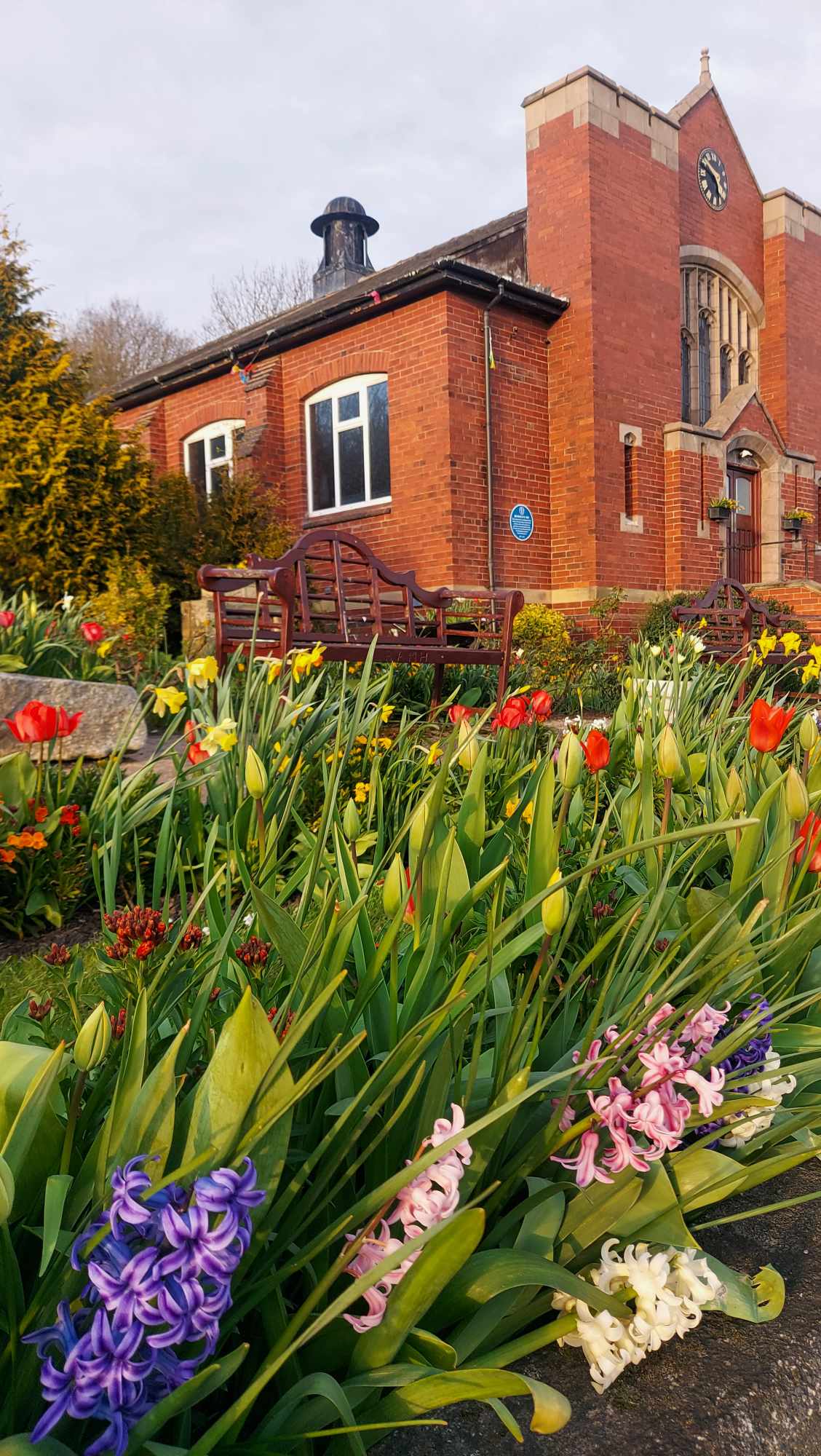 Bowers Allerton Hall in spring, viewed from the garden of remembrance.